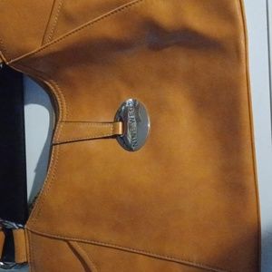 This is a nine west brown leather purse